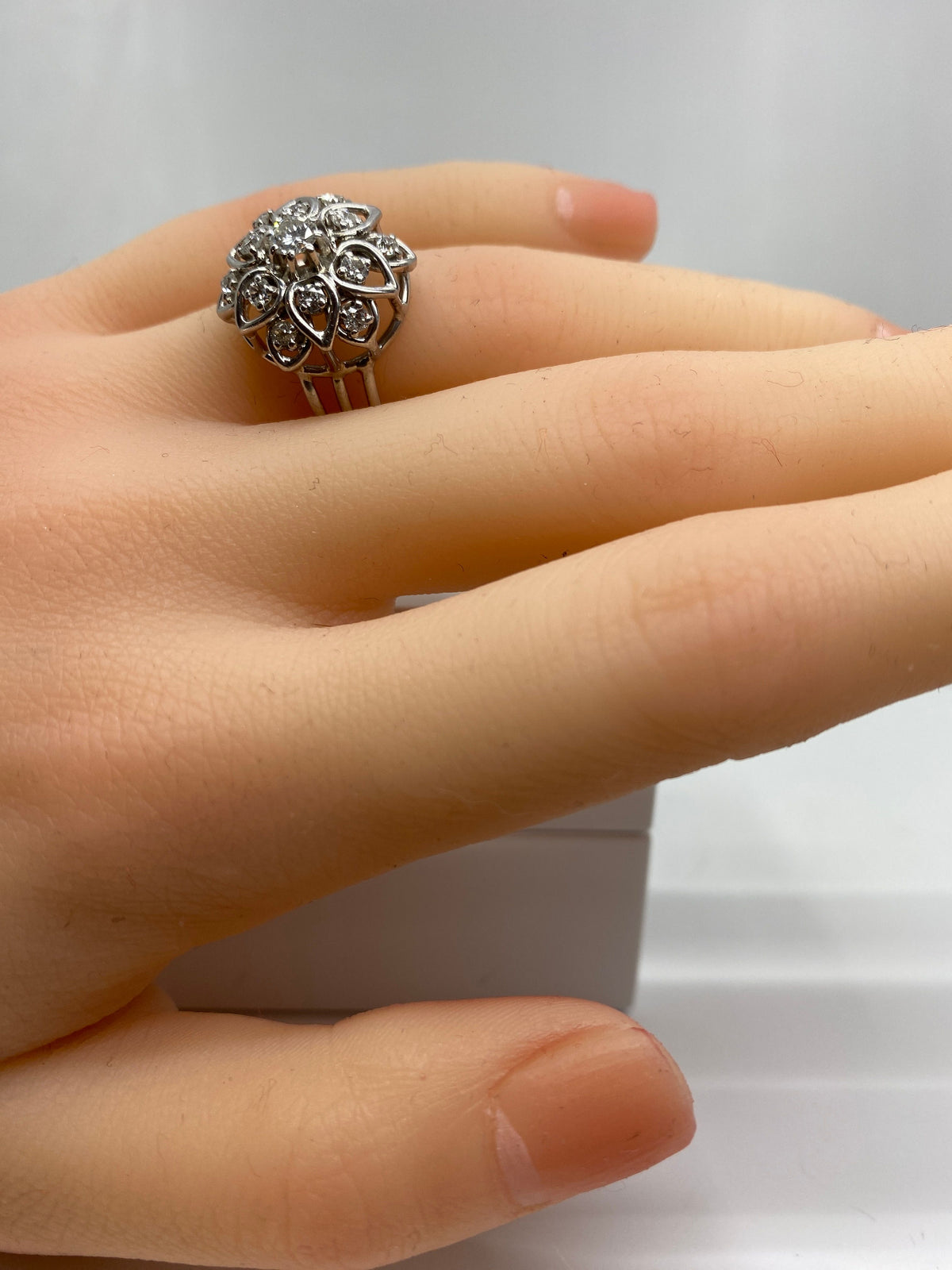 Platinum daisy ring set with diamonds