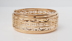 Slave openwork bracelet in yellow gold 