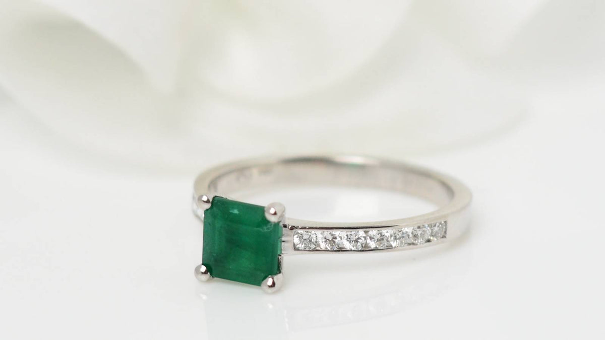 White gold, emerald and diamond ring 