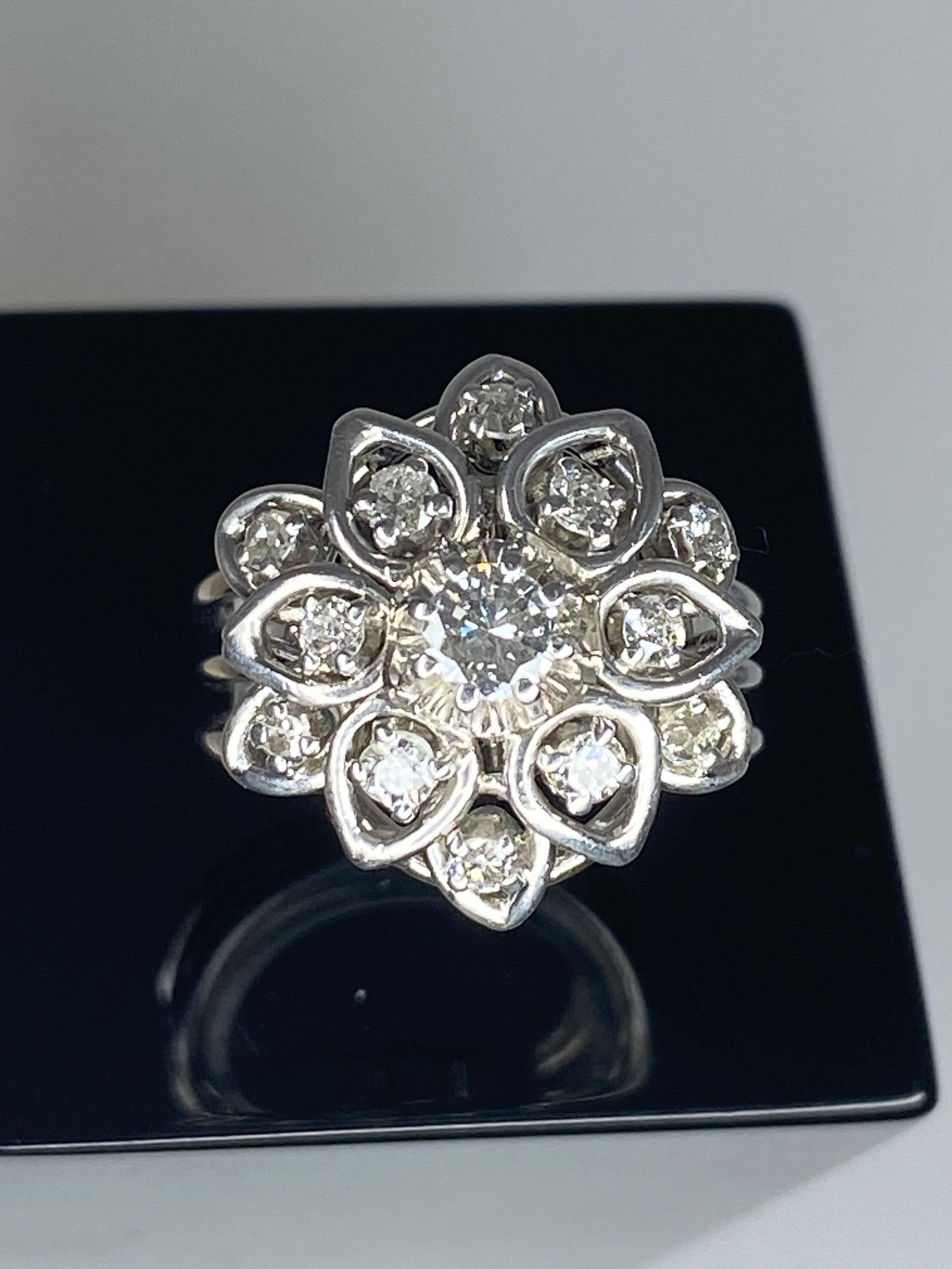 Platinum daisy ring set with diamonds