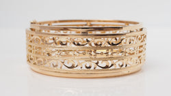 Slave openwork bracelet in yellow gold 