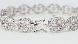 Bracelet ajouré en or blanc et diamants