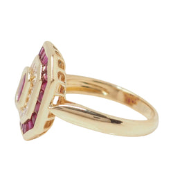 Bague octogonale en or jaune, rubis ovale et diamants