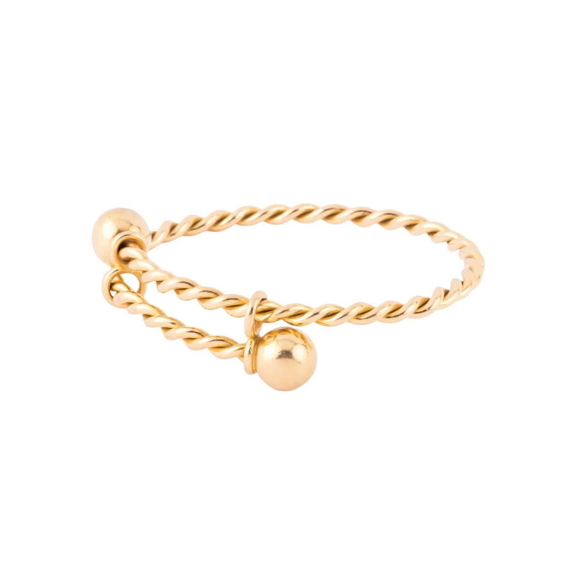 Twisted yellow gold bangle bracelet
