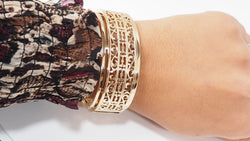 Slave openwork bracelet in yellow gold 