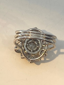 Platinum daisy ring set with diamonds