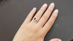 Entourage ring in white gold, rubies and diamonds 