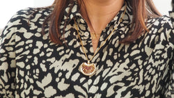 Pendentif en or jaune, rubis et diamants