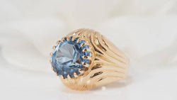 Yellow gold and blue topaz ring 