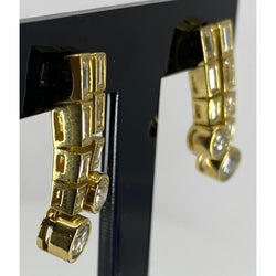 Boucles d’oreilles en or 18 carats en diamants baguettes et diamants ronds