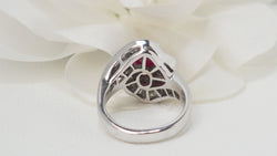 Skirt ring in white gold, rubies and diamonds 