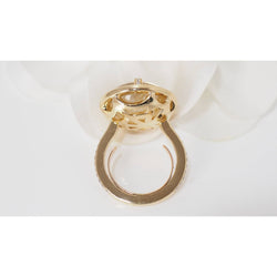 CHAUMET “Attrape Moi Galet” ring in yellow gold, rutilated quartz and diamonds