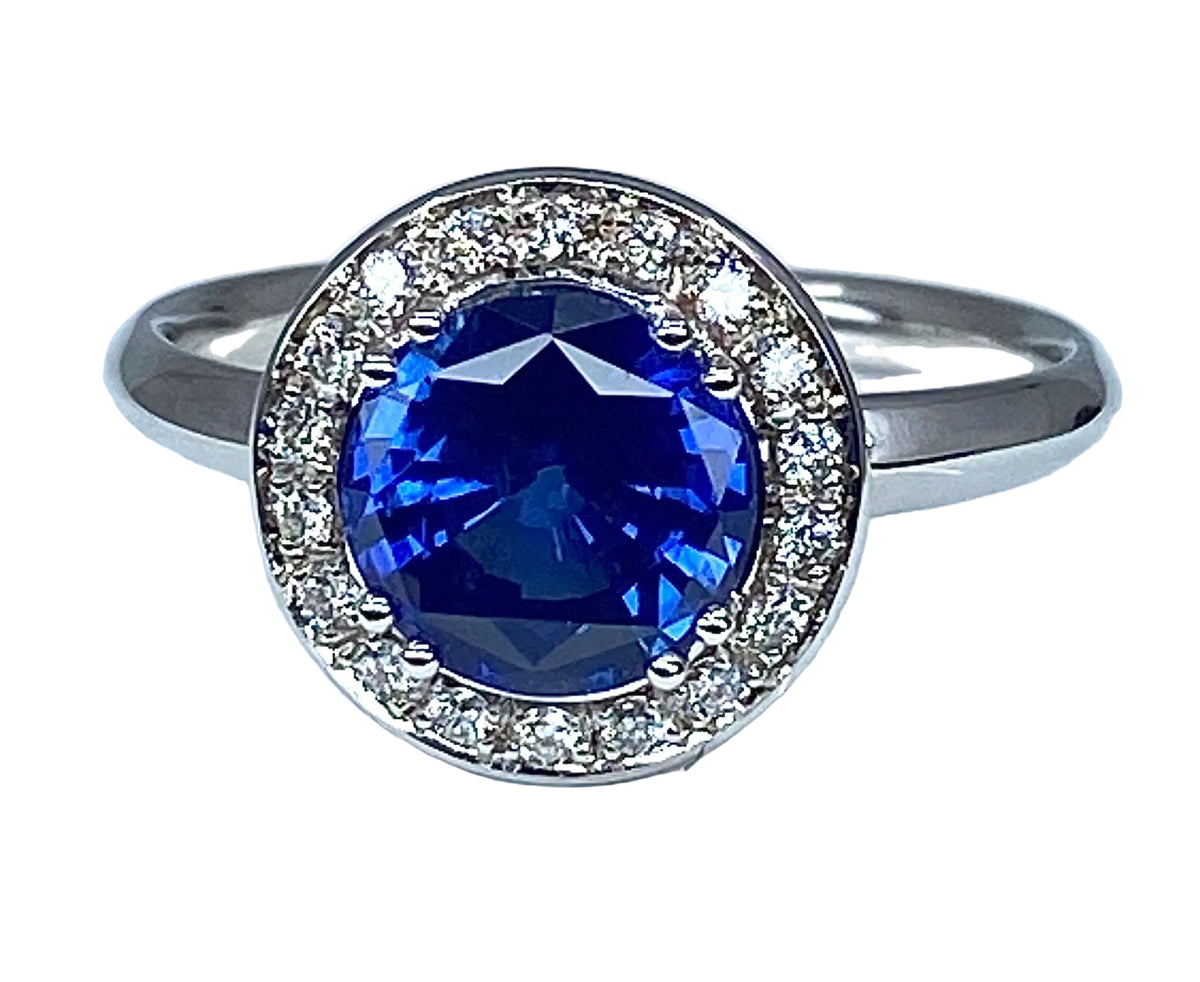 Bague de fiançailles en or blanc 18 carats en saphir et diamants