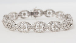 Bracelet ajouré en or blanc et diamants