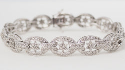 Bracelet ajouré en or blanc et diamants