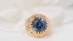 Yellow gold and blue topaz ring 