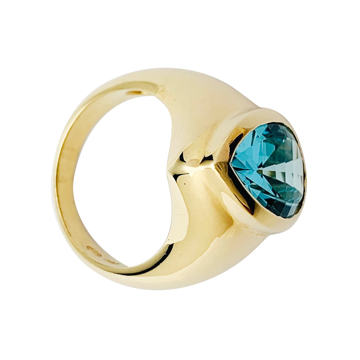 Yellow gold and blue topaz ring