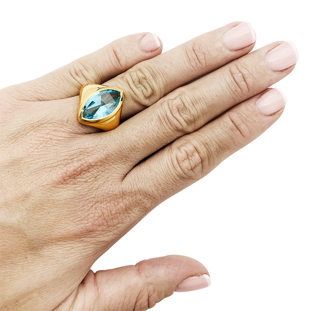 Yellow gold and blue topaz ring