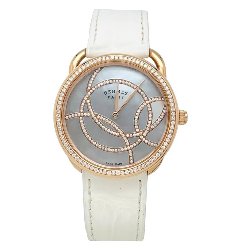 Montre "Arceau" HERMÈS en or rose, diamants et cuir - Castafiore