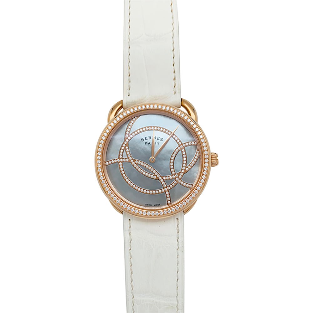 Montre "Arceau" HERMÈS en or rose, diamants et cuir - Castafiore