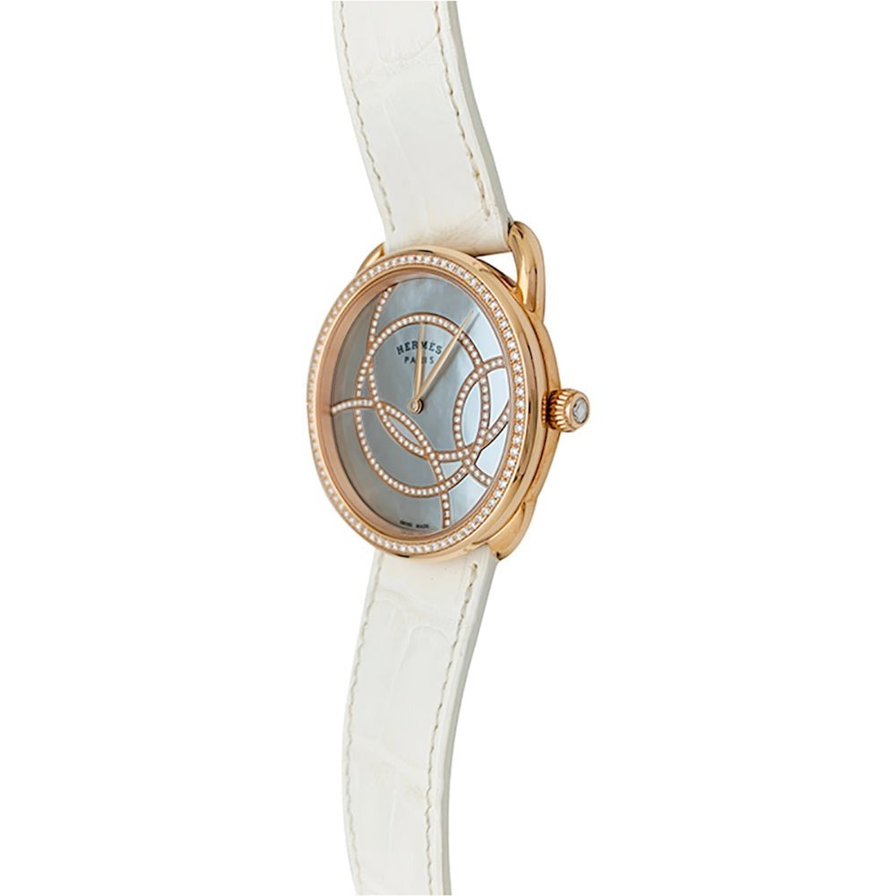 Montre "Arceau" HERMÈS en or rose, diamants et cuir - Castafiore