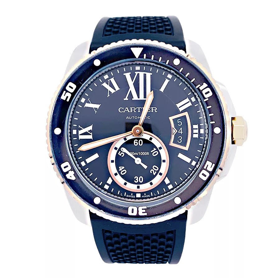 Montre Cartier Calibre en or et acier sur bracelet caoutchouc. - Castafiore