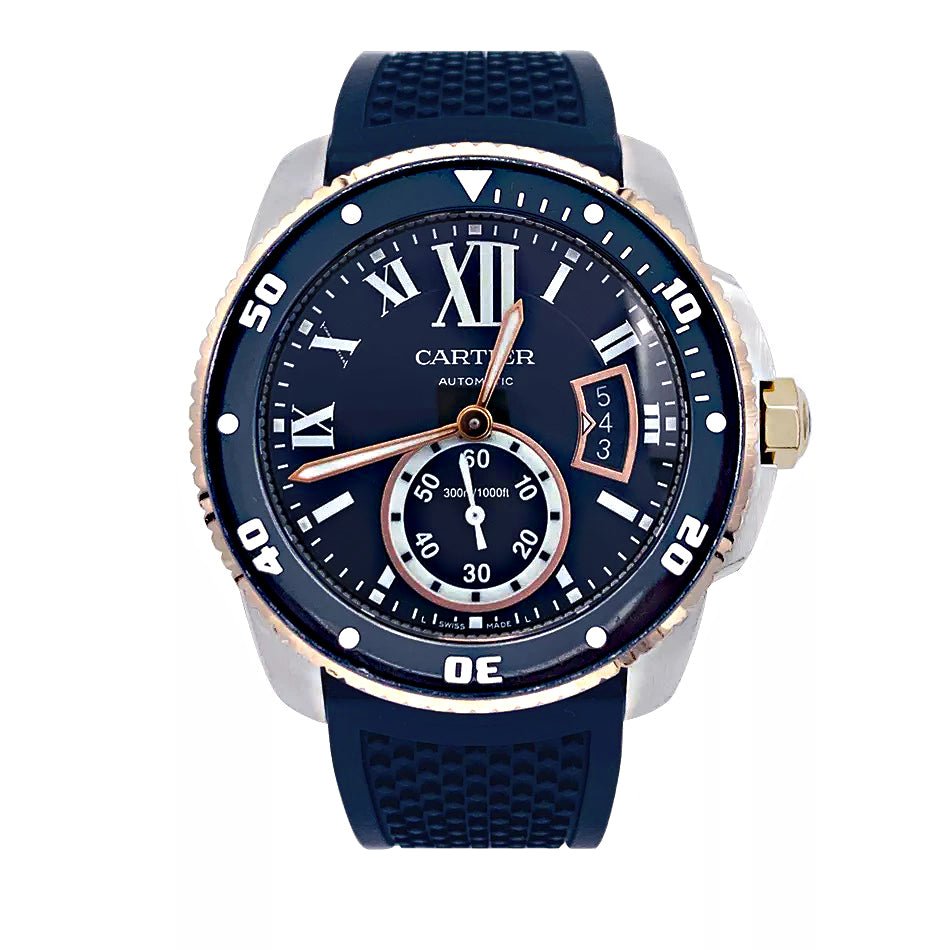 Montre Cartier Calibre en or et acier sur bracelet caoutchouc. - Castafiore