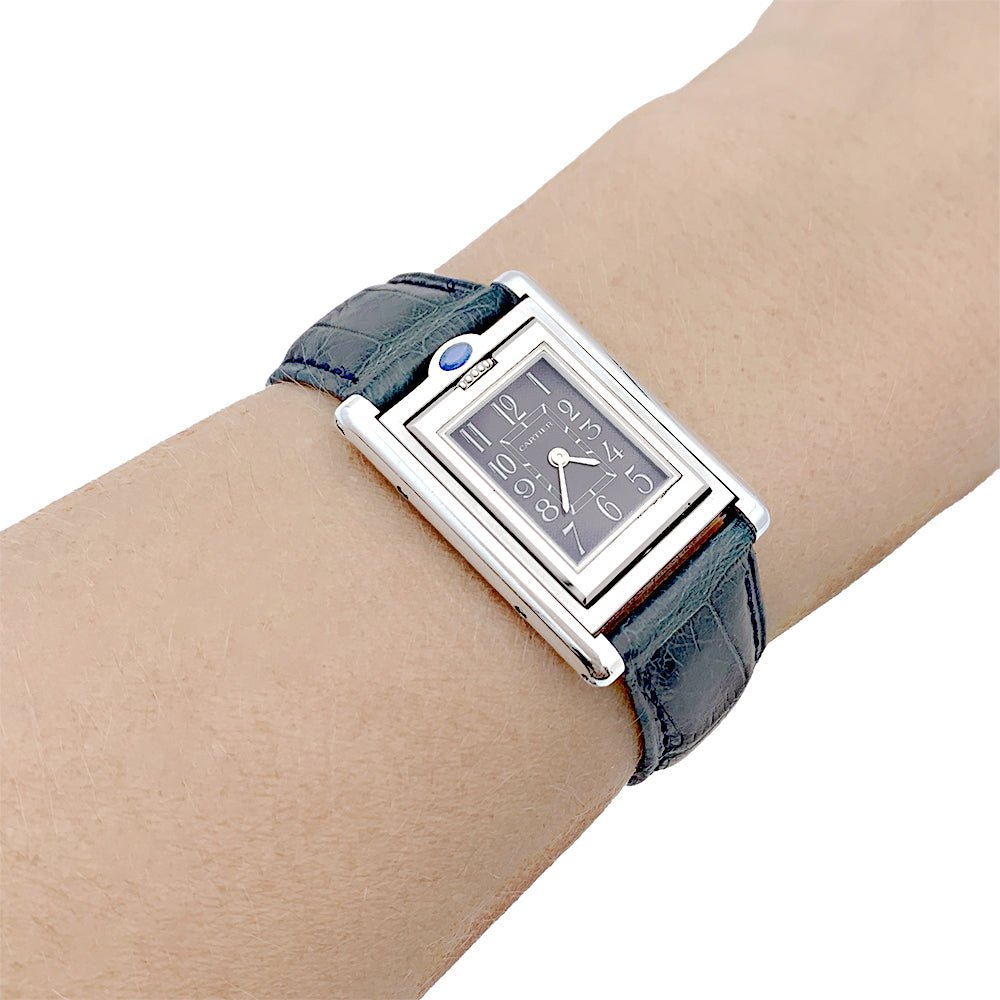 Montre Cartier "Tank basculante" acier, cuir. - Castafiore