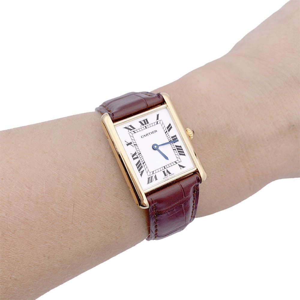 Montre CARTIER "Tank Louis Cartier"en or jaune et cuir - Castafiore