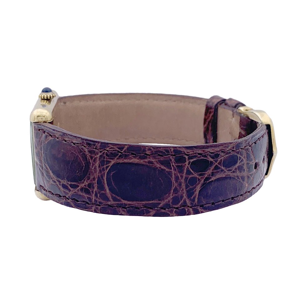 Montre CARTIER "Tank Must" argent plaqué or, cadran laqué marron. - Castafiore