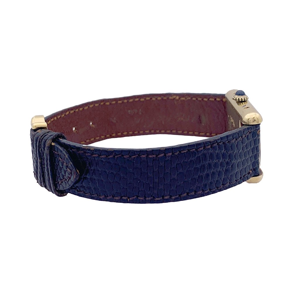 Montre Cartier "Tank Must" argent plaqué or, cadran laqué marron. - Castafiore