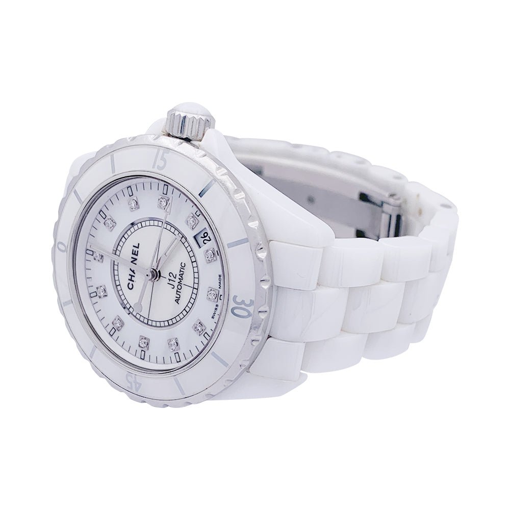 Montre CHANEL "J12" céramique blanche et diamants. - Castafiore