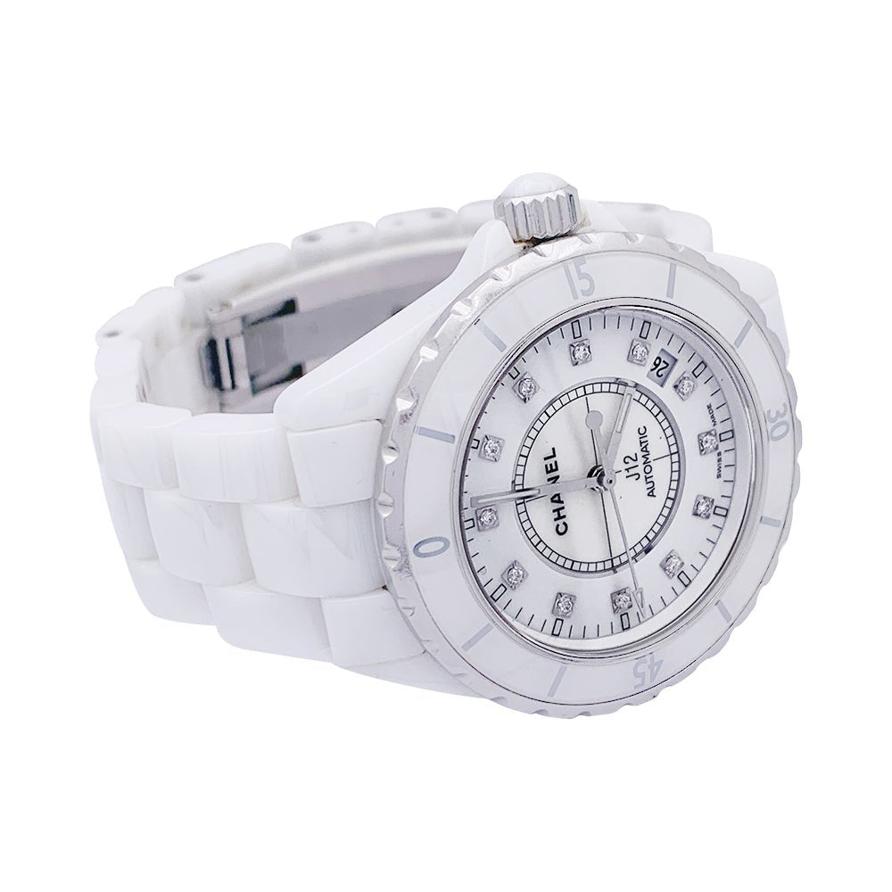 Montre CHANEL "J12" céramique blanche et diamants. - Castafiore