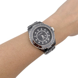 Montre Chanel J12 céramique noire, diamants. - Castafiore