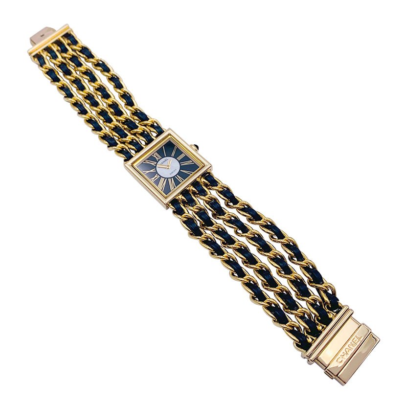 Montre Chanel, "Mademoiselle", or jaune, cuir. - Castafiore