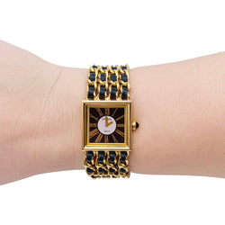 Montre Chanel, "Mademoiselle", or jaune, cuir. - Castafiore