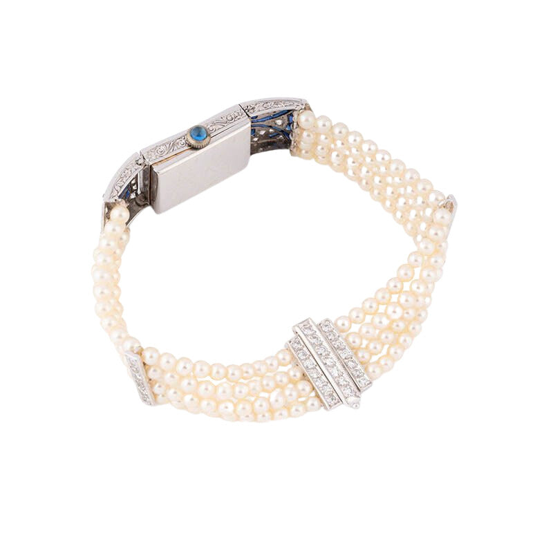 Montre de Dame Art Déco en or blanc, perles, saphirs et diamants - Castafiore
