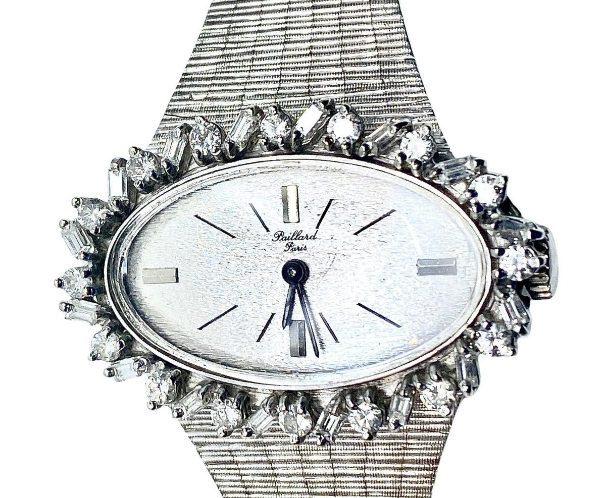 Montre de dame en or blanc et diamants ronds et baguettes. PAILLARD PARIS - Castafiore