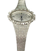 Montre de dame en or blanc et diamants ronds et baguettes. PAILLARD PARIS - Castafiore