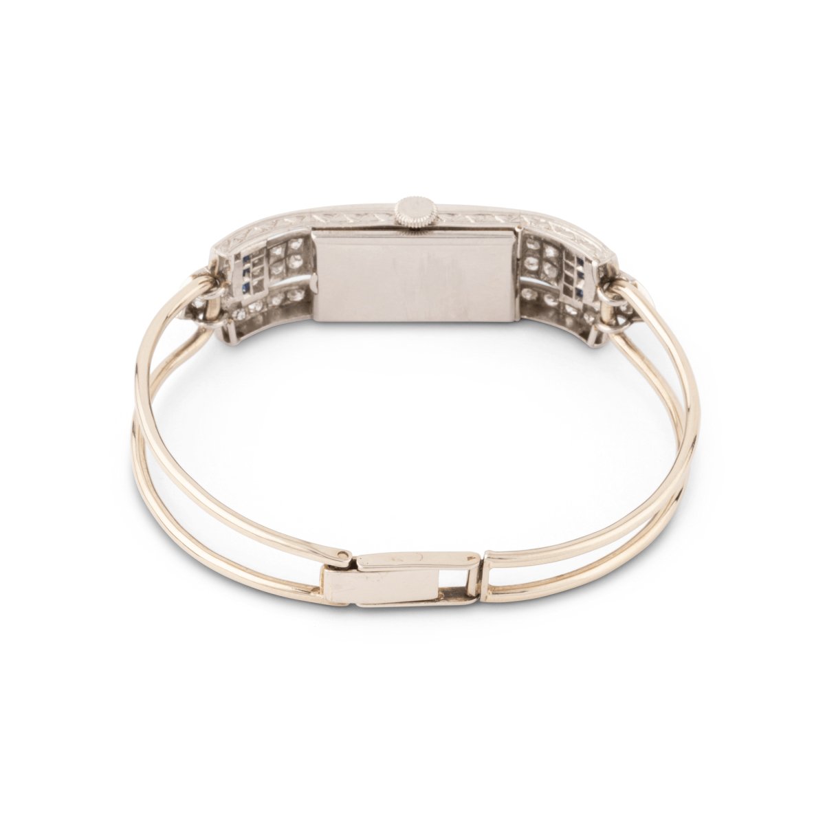 Montre de dame fine en or blanc, platine, brillants et onyx