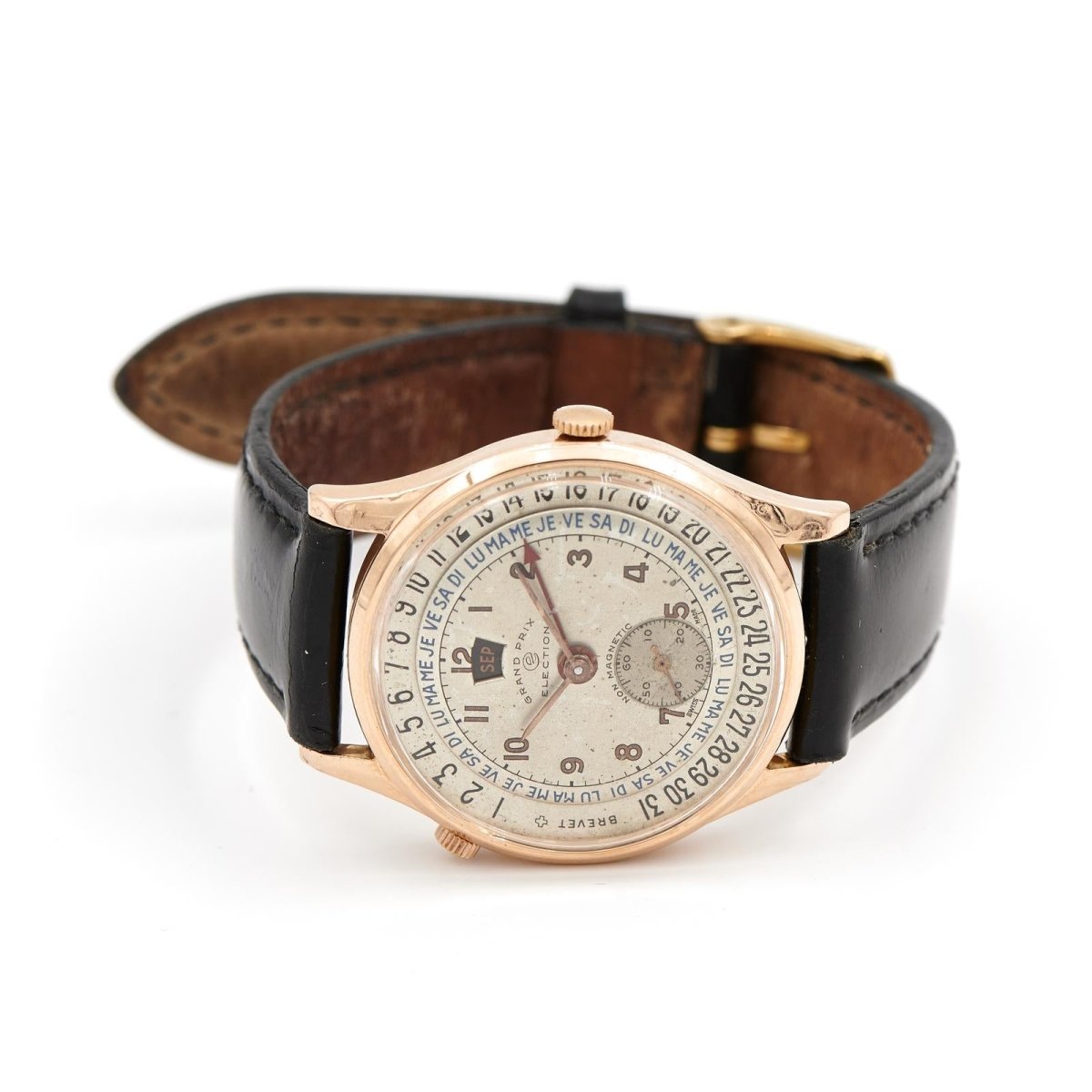 Montre GRAND PRIX ÉLECTION en or jaune et cuir noir - Castafiore