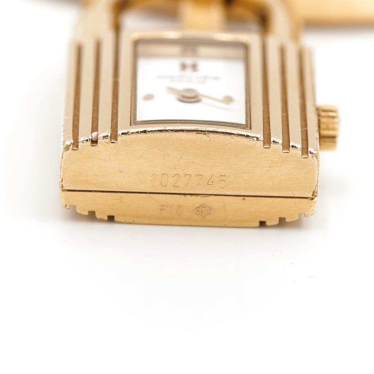 Montre HERMÈS "Kelly" plaqué or et cuir marron - Castafiore