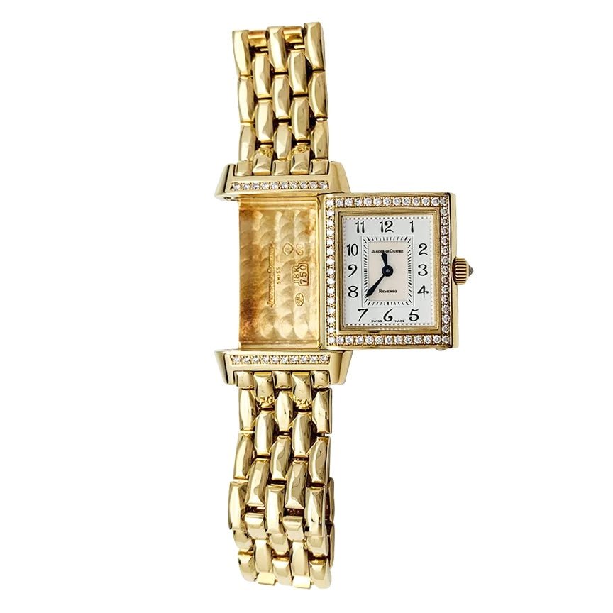 Montre Jaeger Lecoultre "Reverso Duetto" en or jaune, nacre et diamants. - Castafiore