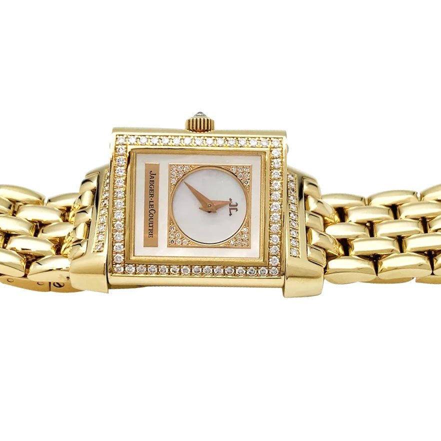 Montre Jaeger Lecoultre "Reverso Duetto" en or jaune, nacre et diamants. - Castafiore