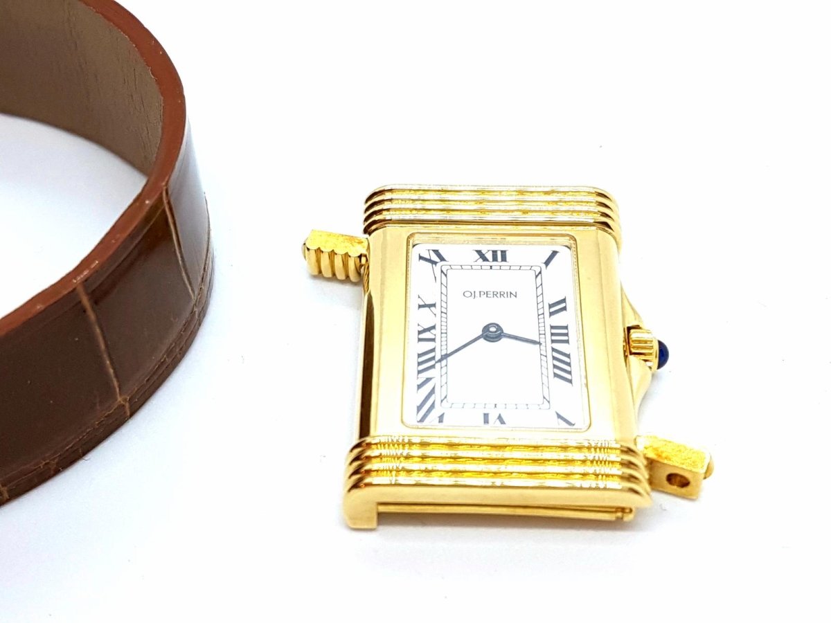 Montre OJ PERRIN en cuir, or jaune et saphir - Castafiore