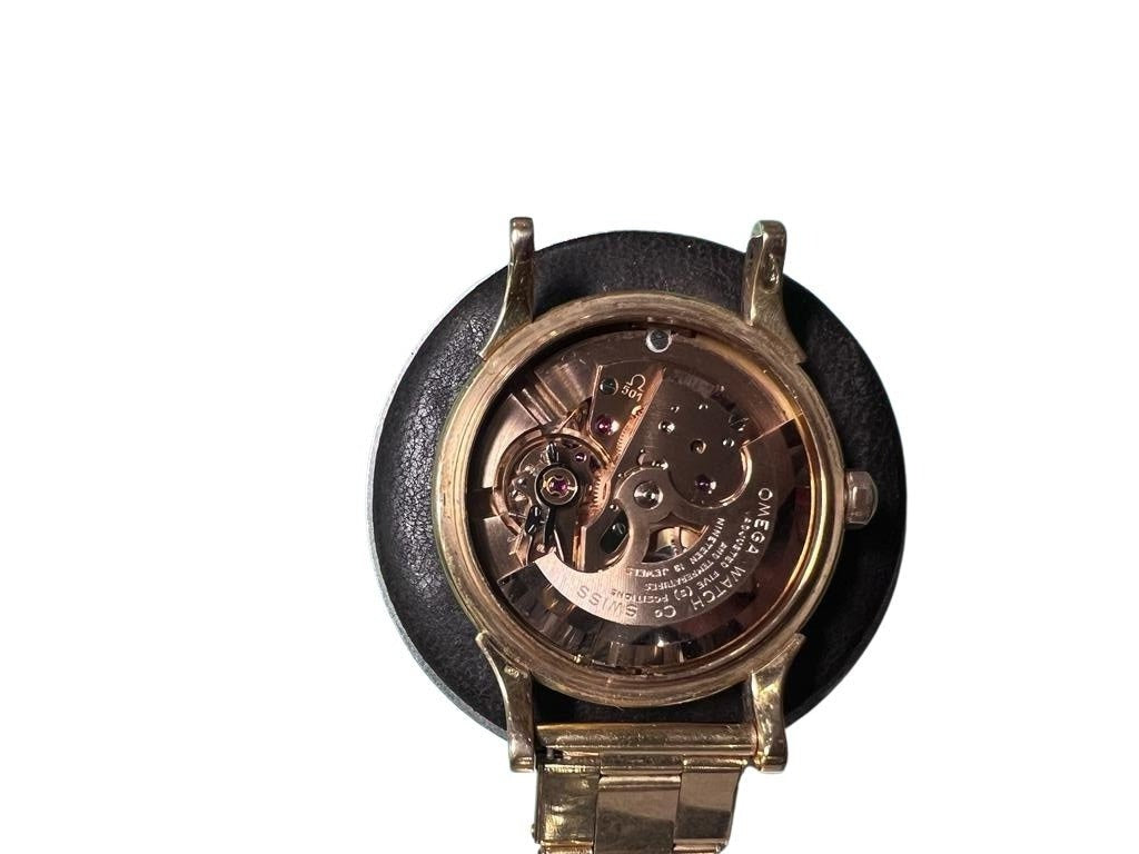 Montre OMEGA Constellation en or jaune - Castafiore