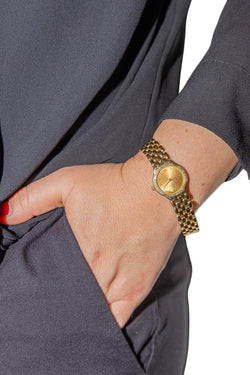 Montre OMEGA en or jaune et diamants - Castafiore