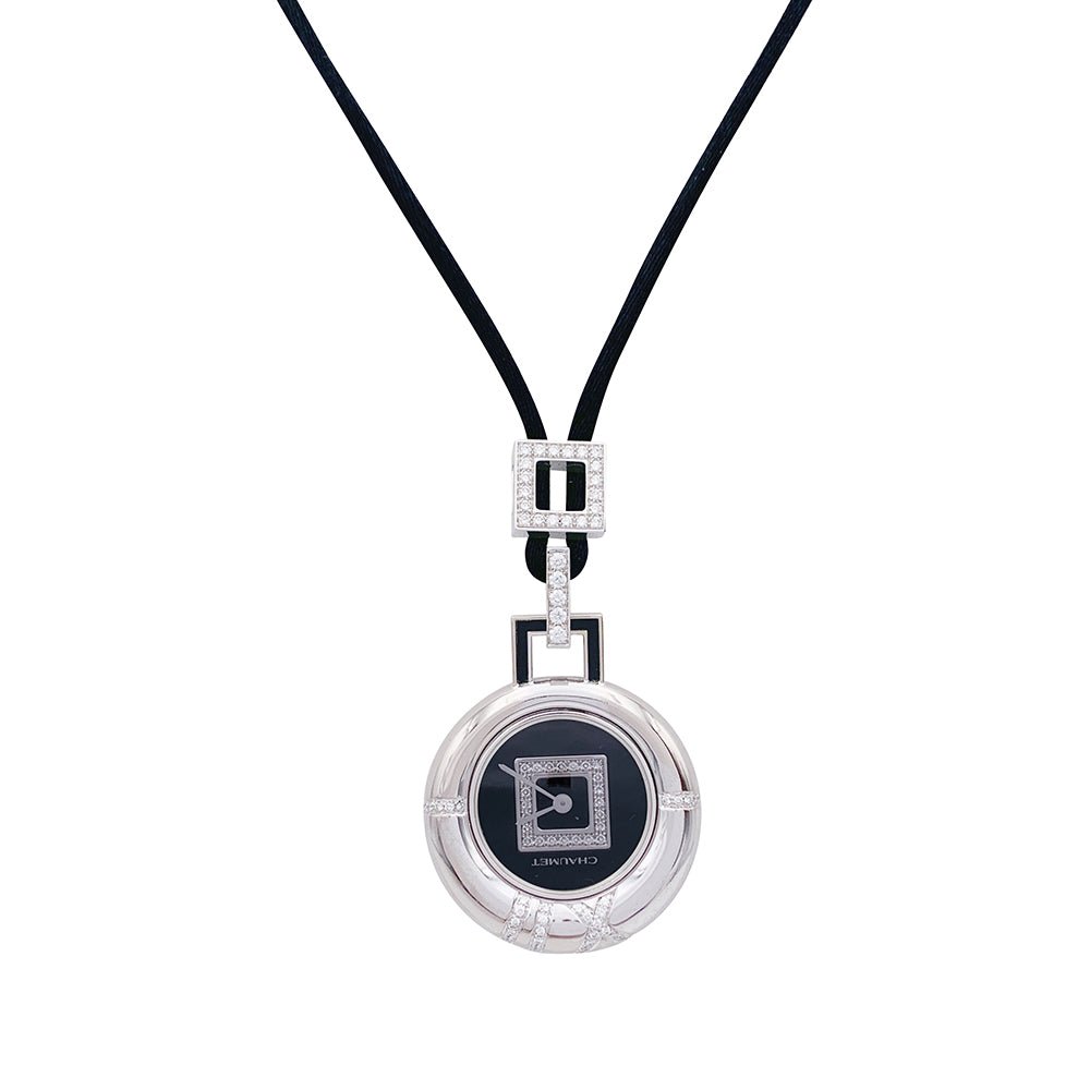Montre Pendentif CHAUMET "Anneau" en or blanc et diamants - Castafiore