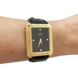 Montre Piaget en or jaune, cuir. - Castafiore