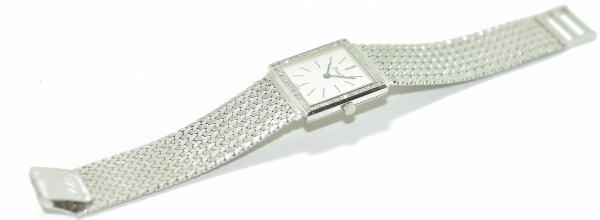 Montre Piaget or gris et diamant - Castafiore